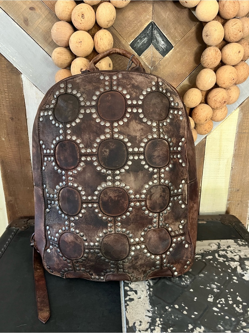 Diophy distressed studded leather backpack